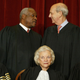 US Supreme Court Justices (L-R, Seated) Chief Justice William H. Rehnquist, Associate Justice Sandra Day O’Connor, Associate Justice, Anthony M. Kennedy, (L-R, Standing) Associate Justice Clarence Thomas and Stephen G. Breyer pose for pictures at the US Supreme Court December 5, 2003 in Washington, DC.